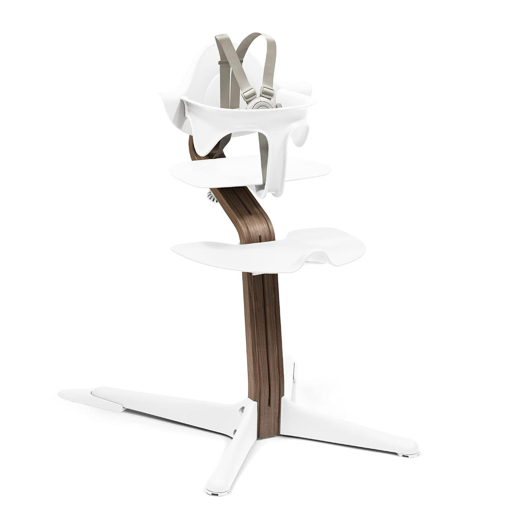 Stokke Nomi High Chair, White/Walnut - Inspires Active Sitting - Tool-Free, Seamless Adjustability - Includes Baby Set with Removable Harness for Children 6-24 Months
