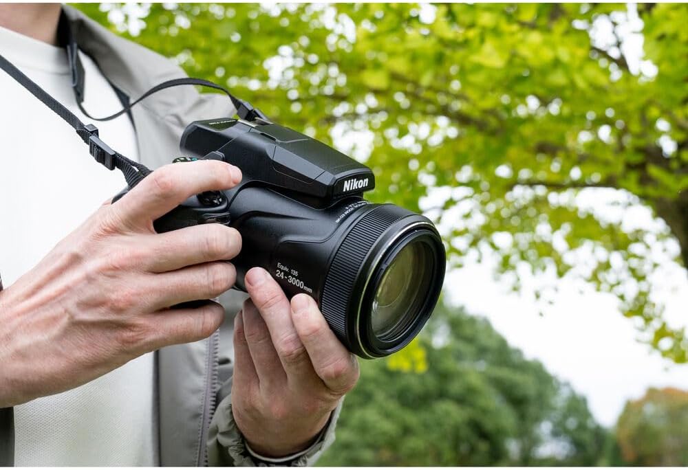 Nikon COOLPIX P1100 125x Super Zoom Compact Digital Camera (26541) + Photo Software + 2 x 64GB Memory Card + Lens Filter Kit + Camera Bag + 2 x EN-EL20 + Charger + More