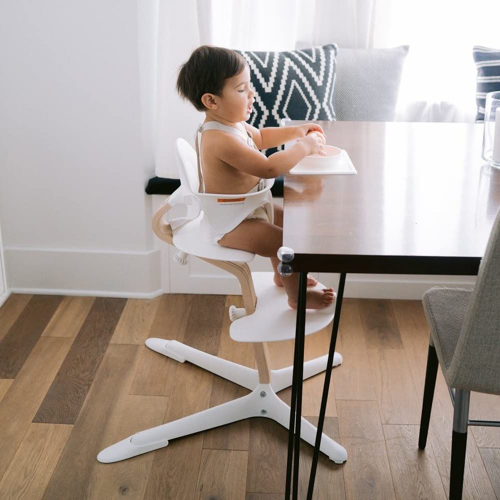 Stokke Nomi High Chair, Black - Inspires Active Sitting - Tool-Free, Seamless Adjustability - Includes Baby Set with Removable Harness for Children 6-24 Months