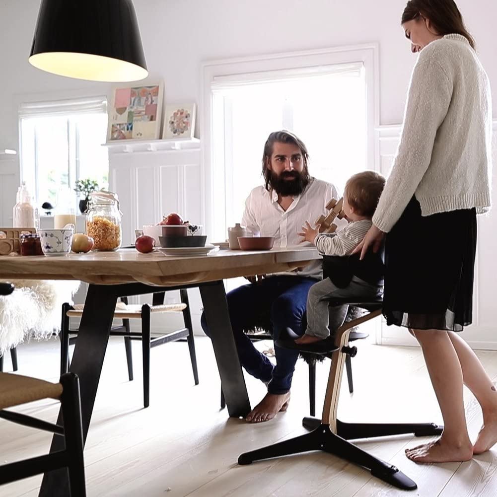 Stokke Nomi High Chair, Black - Inspires Active Sitting - Tool-Free, Seamless Adjustability - Includes Baby Set with Removable Harness for Children 6-24 Months