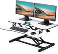 FITUEYES Height Adjustable Standing Desk 36' Wide Sit to Stand Converter Stand Up Desk Tabletop Workstation for Laptops Dual Monitor Riser White SD309103WW