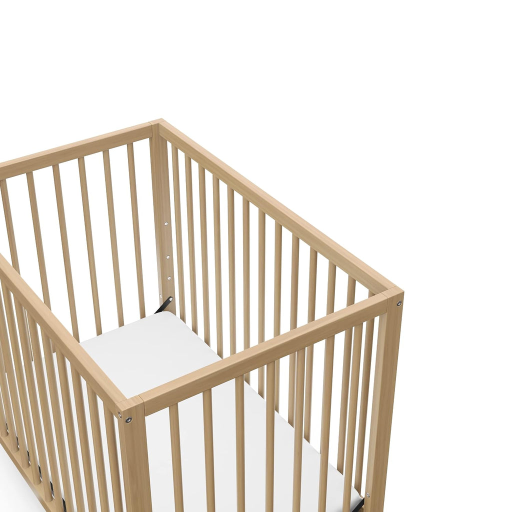 Graco Teddi 4-in-1 Convertible Mini Crib with Bonus Water-Resistant Mattress – GREENGUARD Gold Certified, 2.75-Inch Mattress Included, Small Spaces Crib, Easy 30-Minute Assembly (Driftwood)