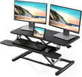 FITUEYES Height Adjustable Standing Desk 36' Wide Sit to Stand Converter Stand Up Desk Tabletop Workstation for Laptops Dual Monitor Riser Black SD309101WB