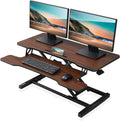FITUEYES Height Adjustable Standing Desk 36' Wide Sit to Stand Converter Stand Up Desk Tabletop Workstation for Laptops Dual Monitor Riser Brown SD309102WE