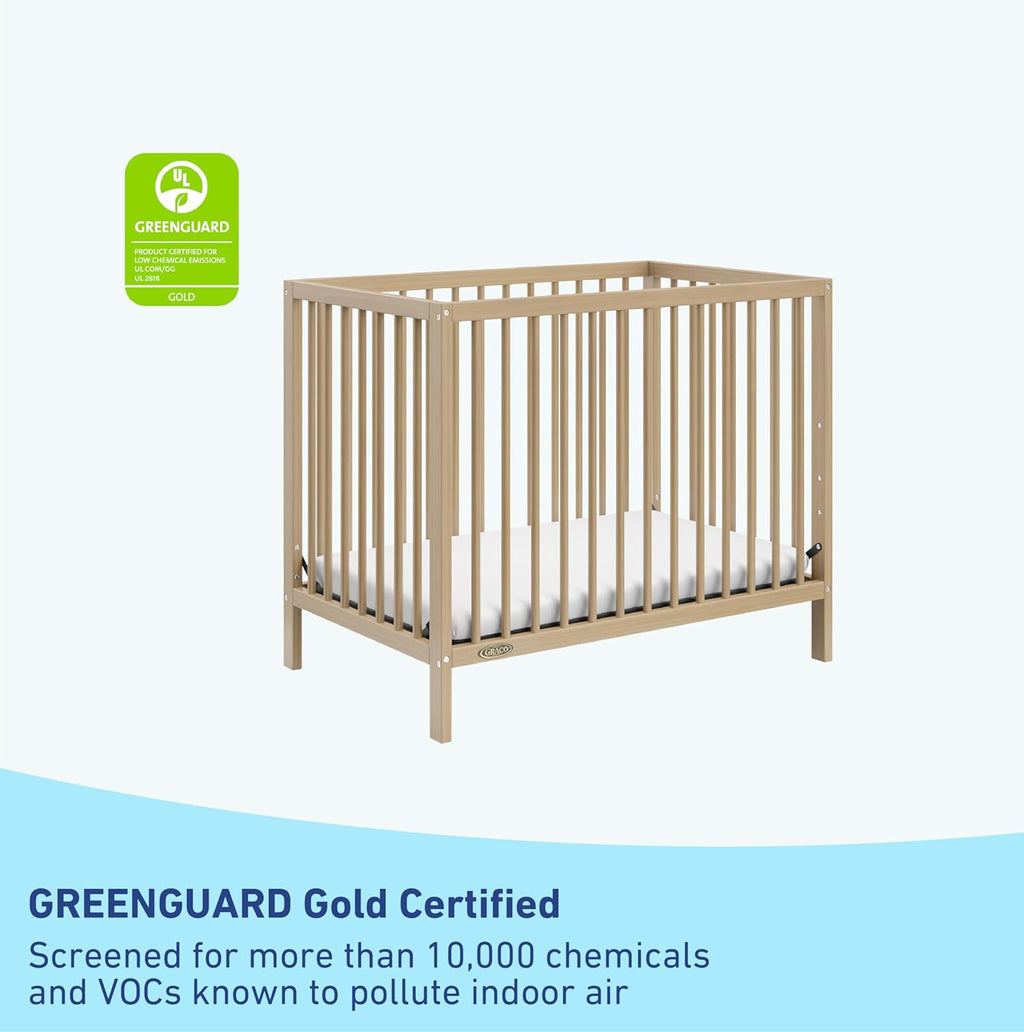 Graco Teddi 4-in-1 Convertible Mini Crib with Bonus Water-Resistant Mattress – GREENGUARD Gold Certified, 2.75-Inch Mattress Included, Small Spaces Crib, Easy 30-Minute Assembly (Driftwood)