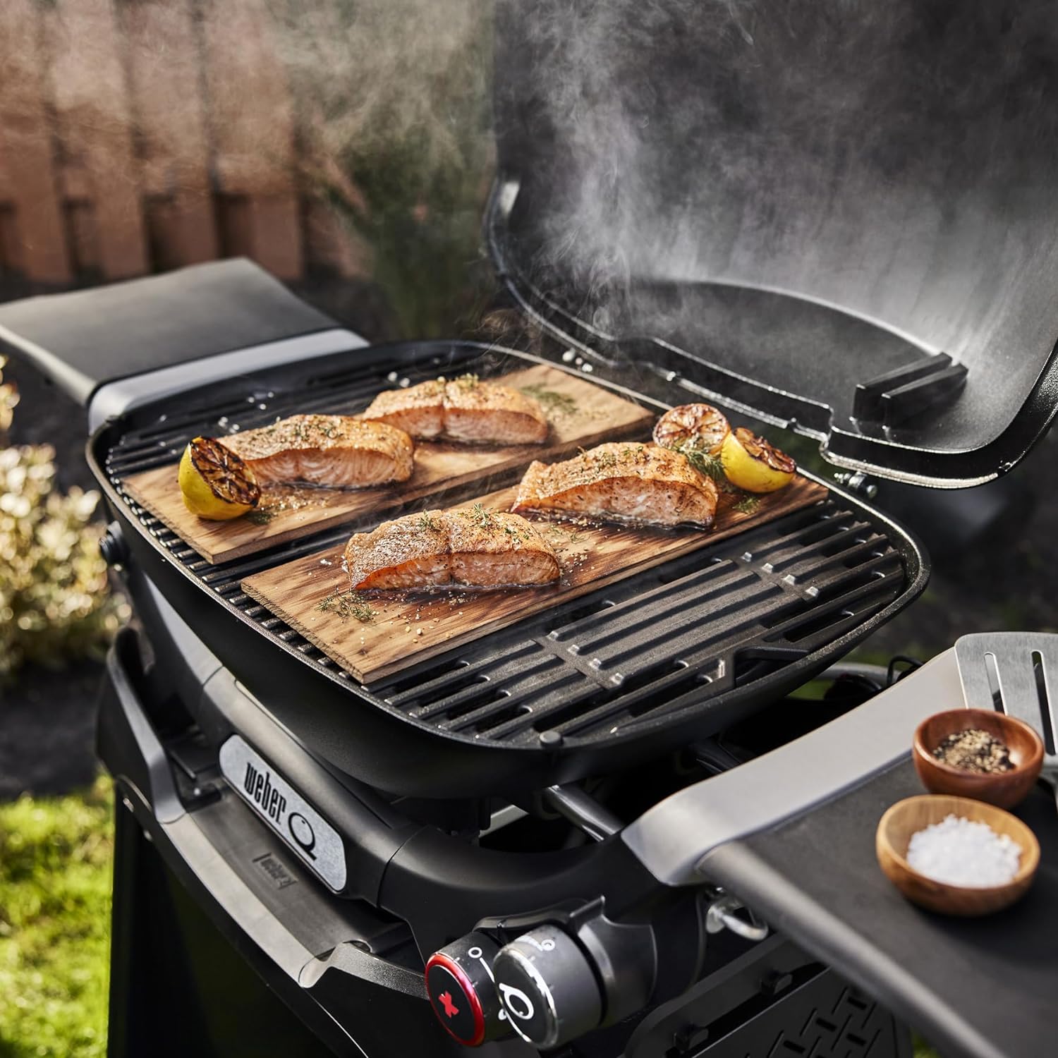 Weber Q 2800N+ Liquid Propane Grill with Stand, Midnight Black – Wide 250°–700°F Temp Range with Plus Burner for Searing, Low‑Temp Roasting & High-Dome Lid