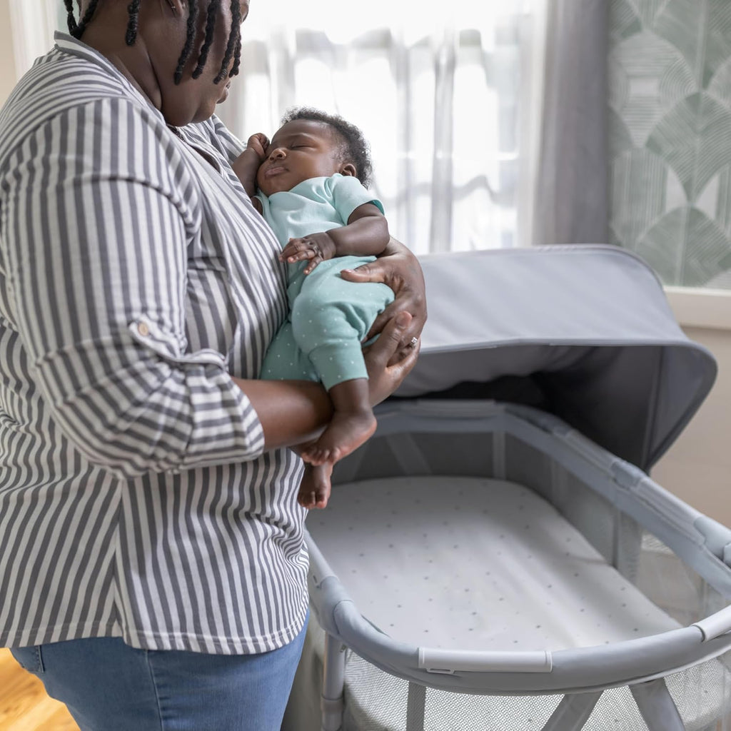 Ingenuity Dream Retreat 3-in-1 Portable Bassinet & Playard, Easy 3-Step Fold, Includes Indoor Outdoor UPF 50+ Light Blocking Shade, Mattress, & Sheet, 0-36 Months - Neutral