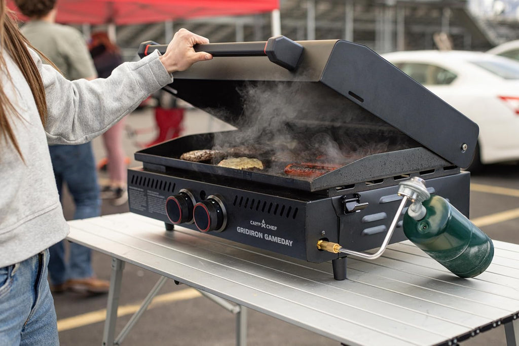 Gridiron Gameday 24' Portable Propane Grill – Flat Top Tabletop Griddle with Hinged Lid, 24,000 BTUs, Flamethrower Ignition, Dual Heat Zones, Adjustable Legs for Tailgating, Camping & Outdoor Cooking