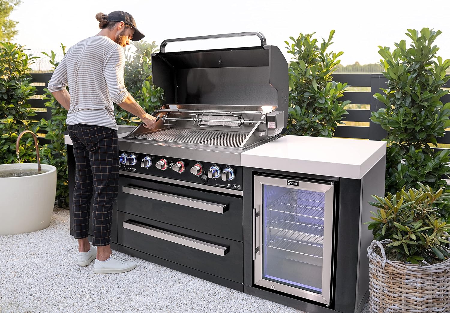 Mont Alpi Black Series Stainless Steel 94'W x 23'D Modular Outdoor Kitchen Island + Side Burner + Refrigerator + 44'W 6-Burner BBQ Gas Grill + White Granite Countertops + Storage Cabinets & Drawers