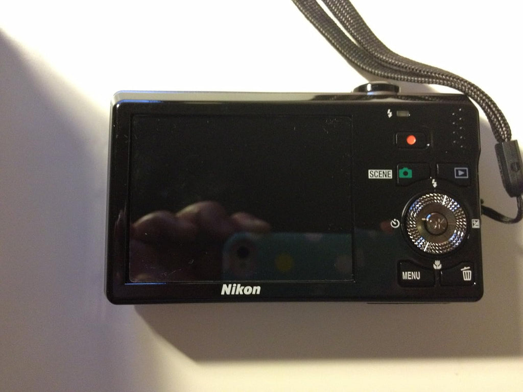 Nikon Coolpix S6000 14 MP Digital Camera with 7x Optical Vibration Reduction (VR) Zoom and 2.7-Inch LCD (Red)