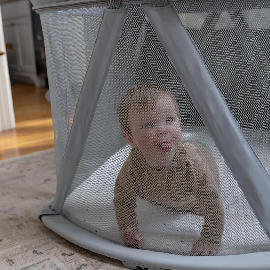 Ingenuity Dream Retreat 3-in-1 Portable Bassinet & Playard, Easy 3-Step Fold, Includes Indoor Outdoor UPF 50+ Light Blocking Shade, Mattress, & Sheet, 0-36 Months - Neutral